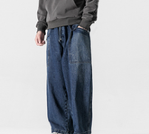 Jeans de pierna ancha con diseño plisado